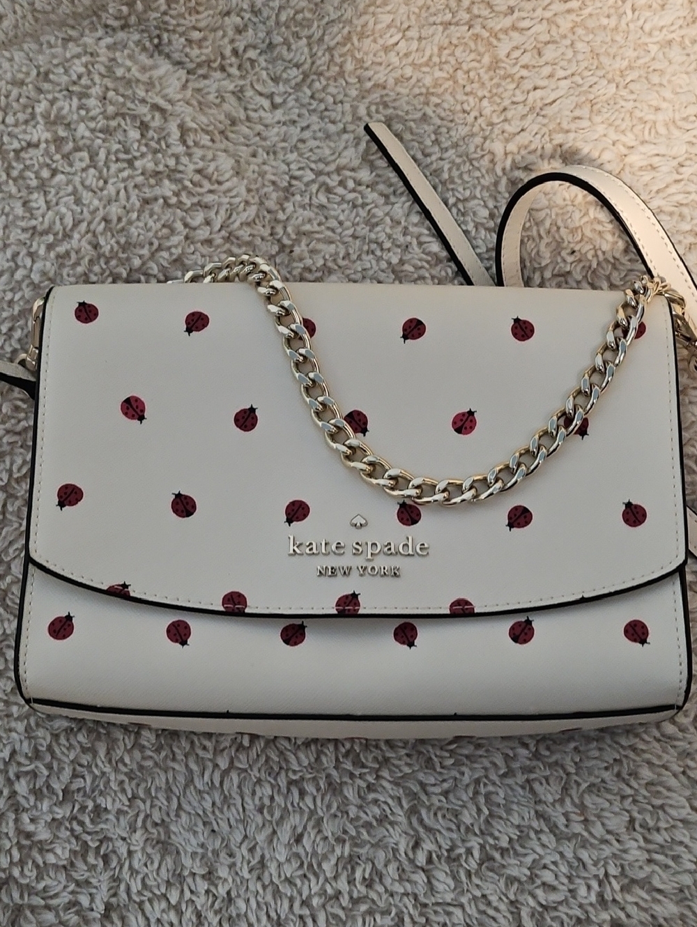 kate spade Cream Crossbody with Red Ladybug Print and Gold Chain